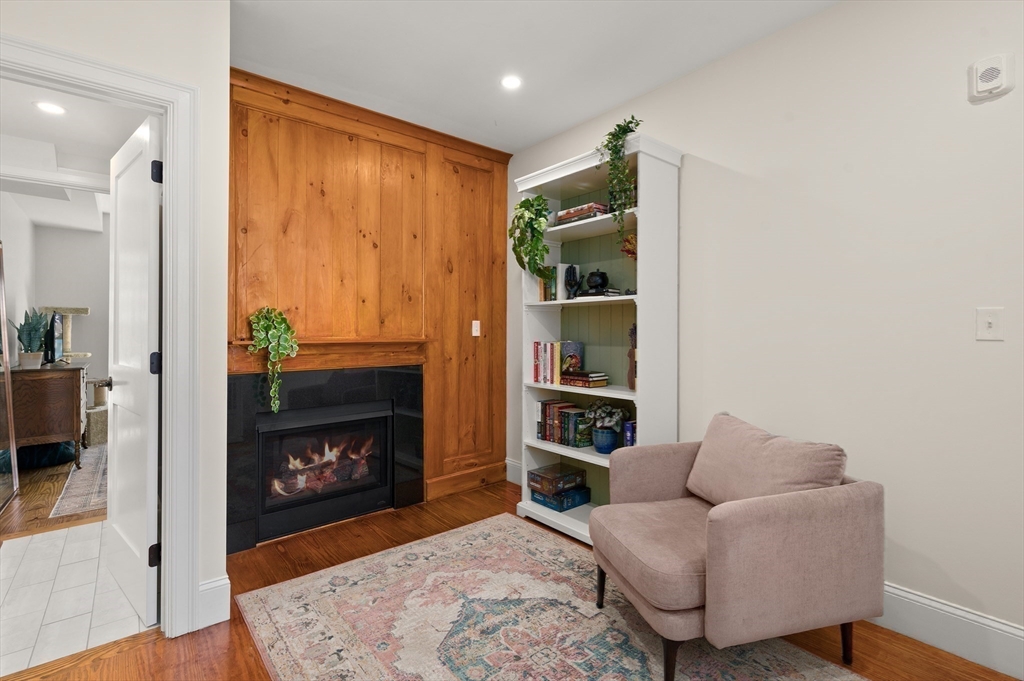 12 Mall Street, Unit C Salem, MA 01970 - Photo 14 of 31 a living room with furniture and a fireplace