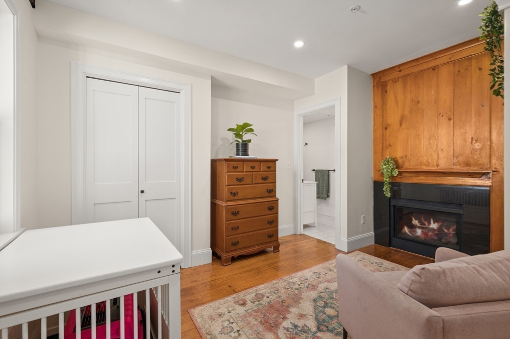 12 Mall Street, Unit C Salem, MA 01970 - Photo 15 of 31 a living room with furniture and a fireplace
