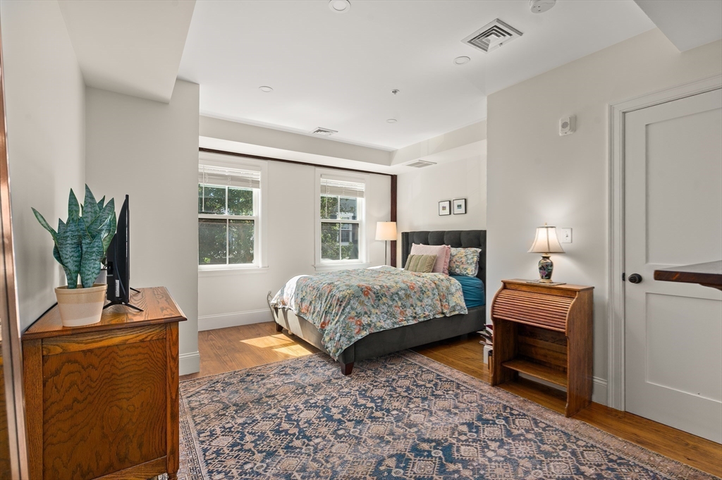 12 Mall Street, Unit C Salem, MA 01970 - Photo 16 of 31 a bedroom with a bed and a window