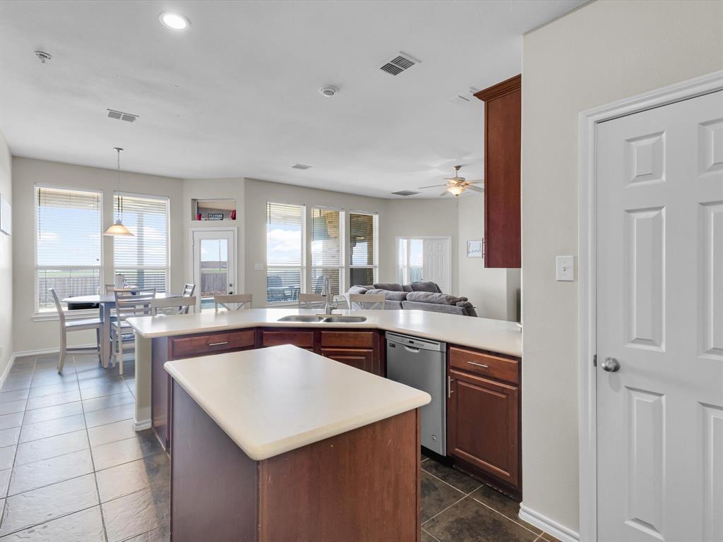 205 King George Road Ponder, TX 76259 - Photo 15 of 37 Kitchen featuring a center island, wood-finish cabinetry, and recessed lighting