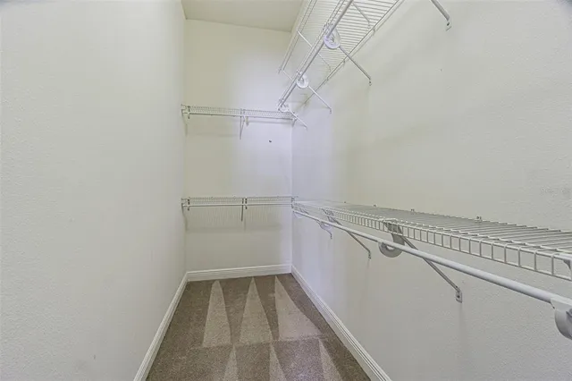 a view of a room with racks on the wall