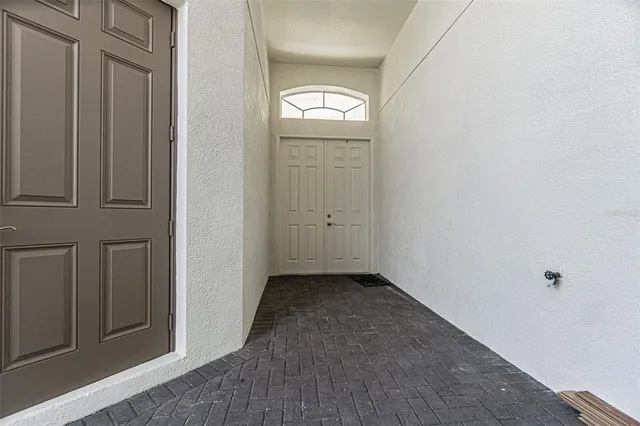 an empty room with windows