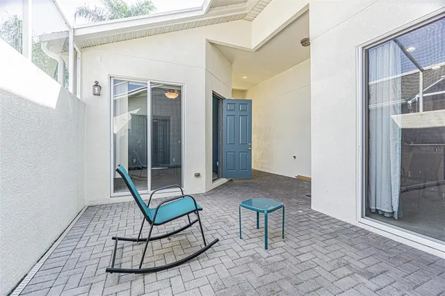 a view of a entryway with furniture and door