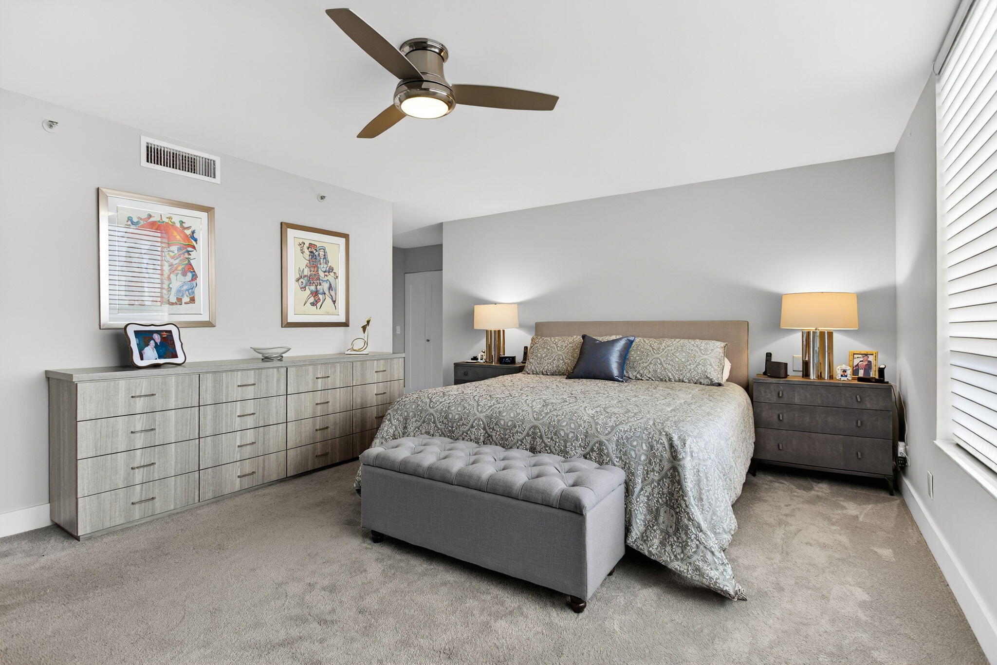 7186 Promenade Drive, Unit 701 Boca Raton, FL 33433 - Photo 20 of 39 a spacious bedroom with a bed and a window