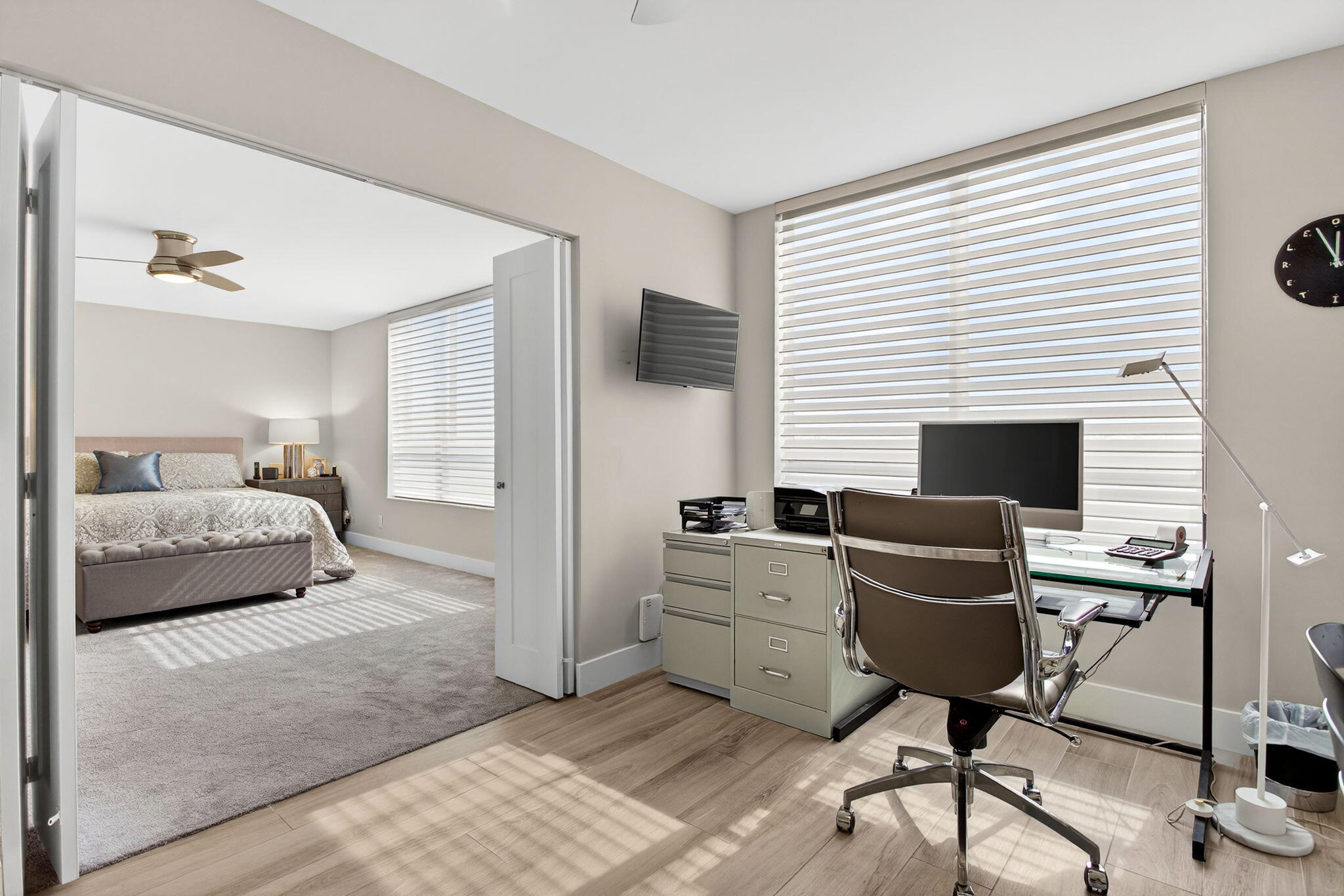 7186 Promenade Drive, Unit 701 Boca Raton, FL 33433 - Photo 25 of 39 a bedroom with furniture and a fireplace