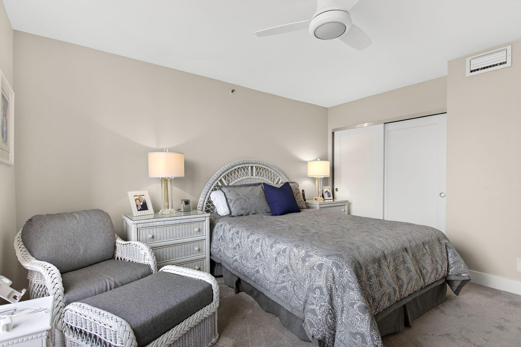 7186 Promenade Drive, Unit 701 Boca Raton, FL 33433 - Photo 31 of 39 a bedroom with a bed and a couch