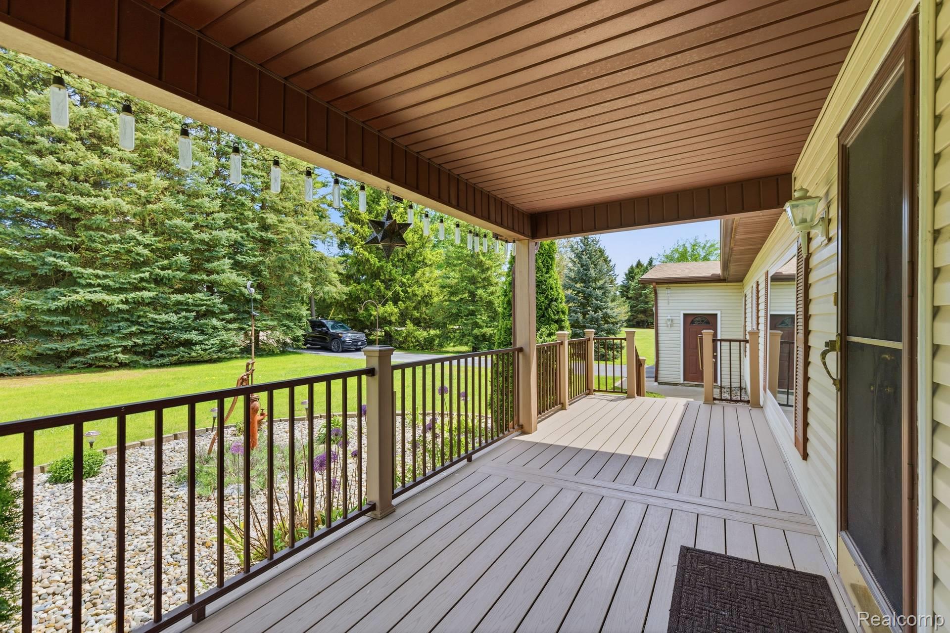 70919 Coon Creek Road Armada, MI 48005 - Photo 6 of 50 Wooden deck with a lawn