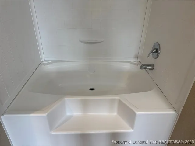 a close up of a bathtub