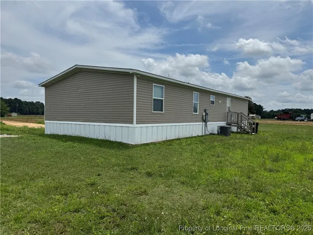 a backyard view with garden