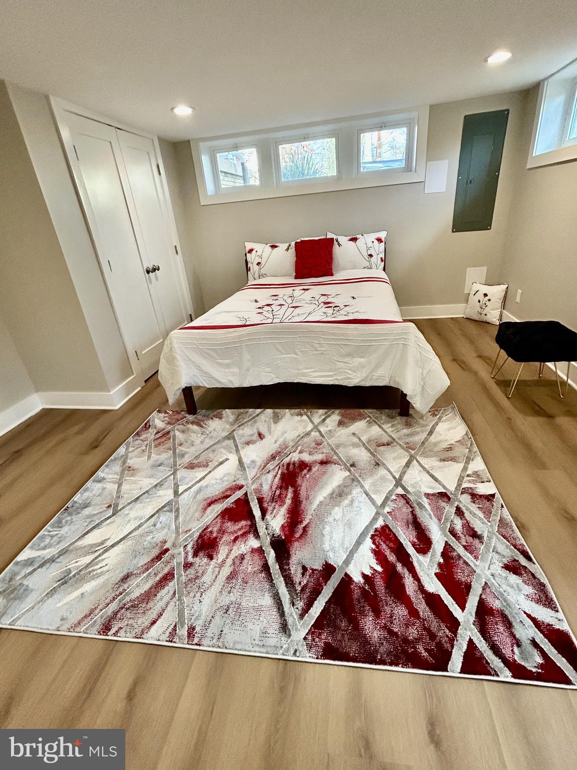 1516 Hamilton Street Northwest Washington, DC 20011 - Photo 7 of 14 a living room with a rug