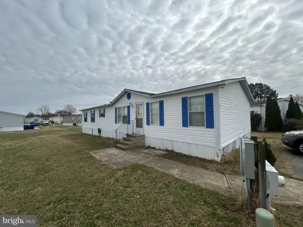 a house view with a backyard space