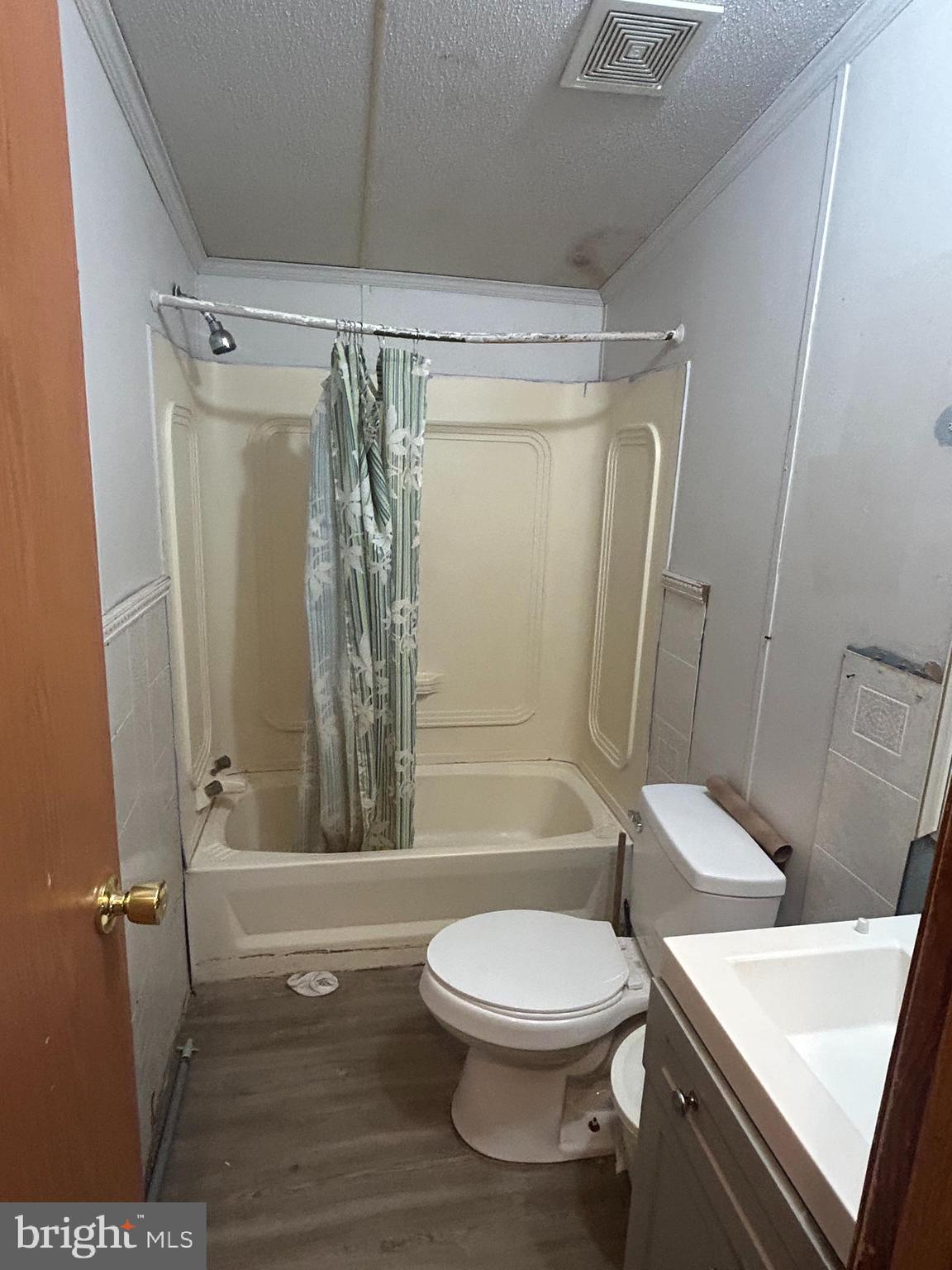 47 Evidence Road, Unit 231 Magnolia, DE 19962 - Photo 13 of 19 a bathroom with a toilet a sink and a shower