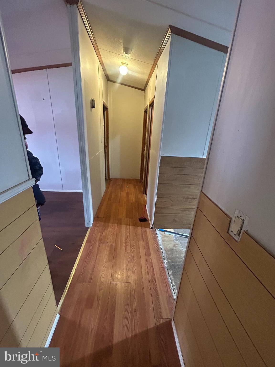 47 Evidence Road, Unit 231 Magnolia, DE 19962 - Photo 14 of 19 a view of wooden floor in a building