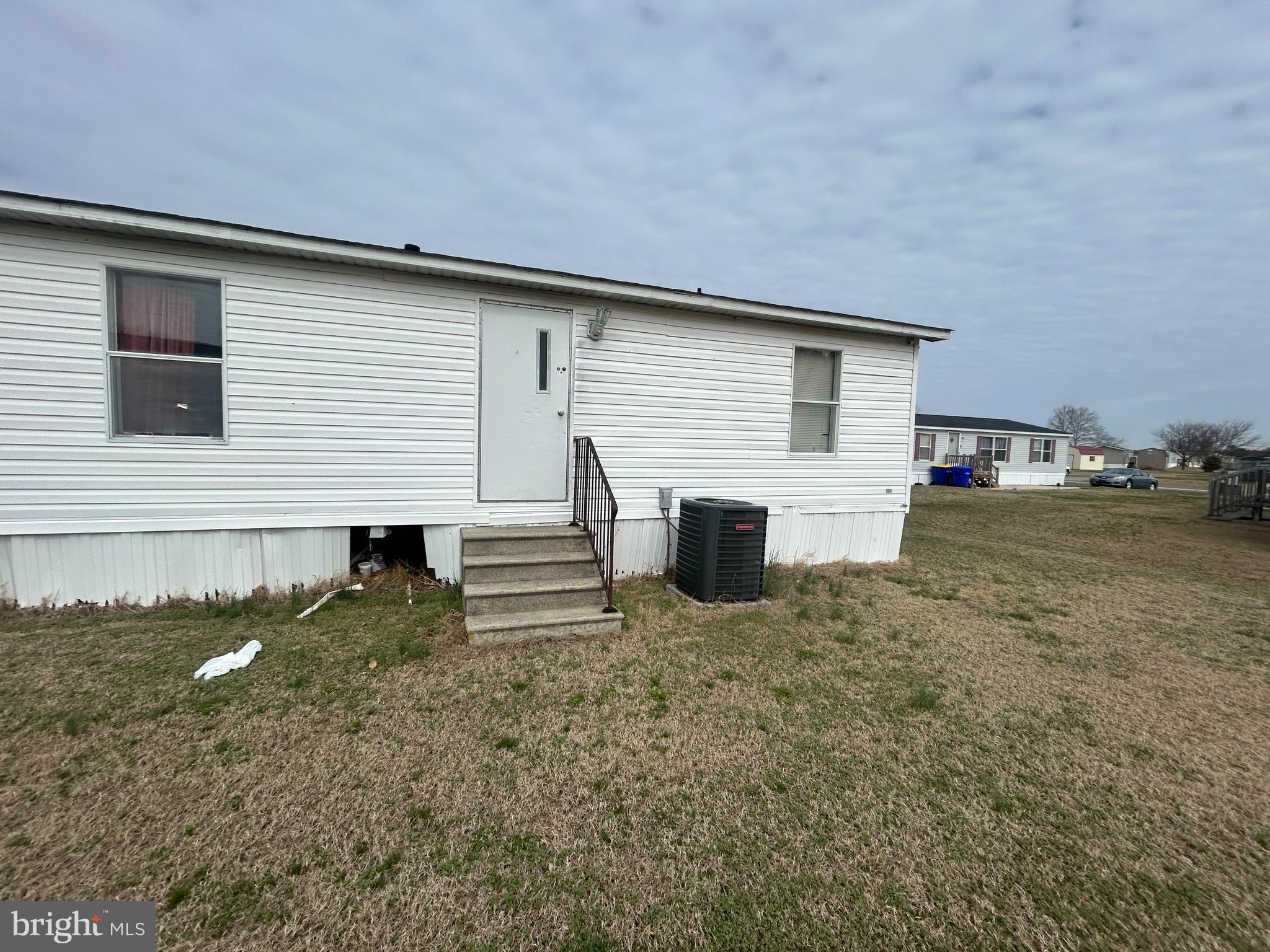 47 Evidence Road, Unit 231 Magnolia, DE 19962 - Photo 17 of 19 a house view with a backyard space