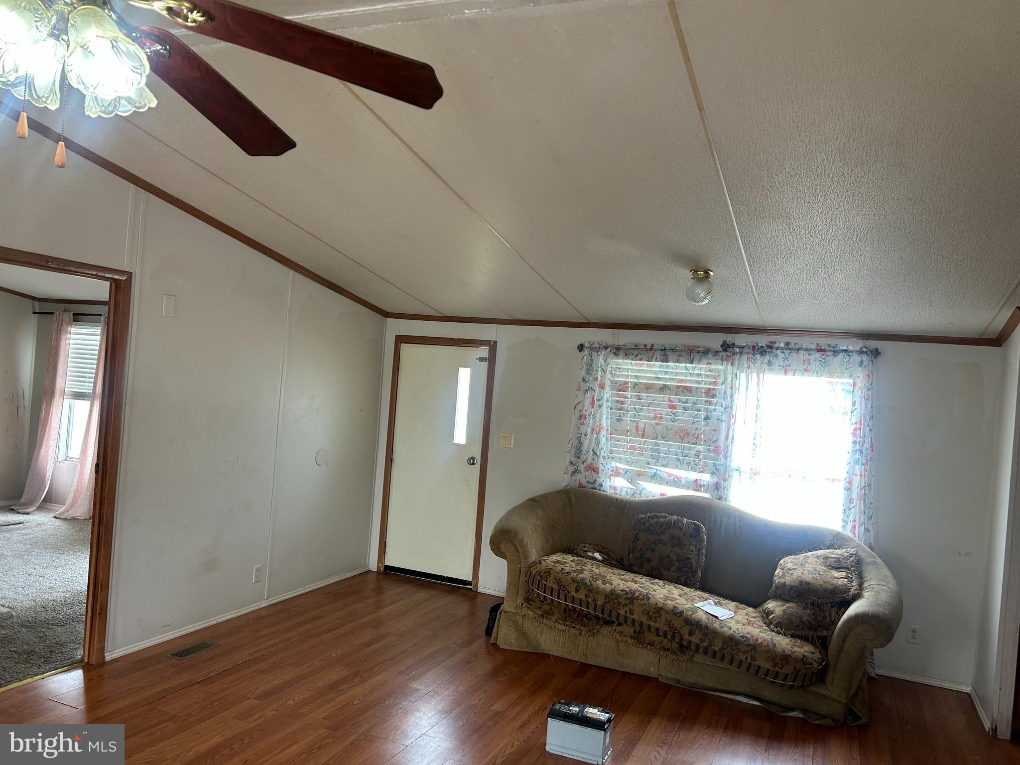 47 Evidence Road, Unit 231 Magnolia, DE 19962 - Photo 4 of 19 a living room with furniture and a window