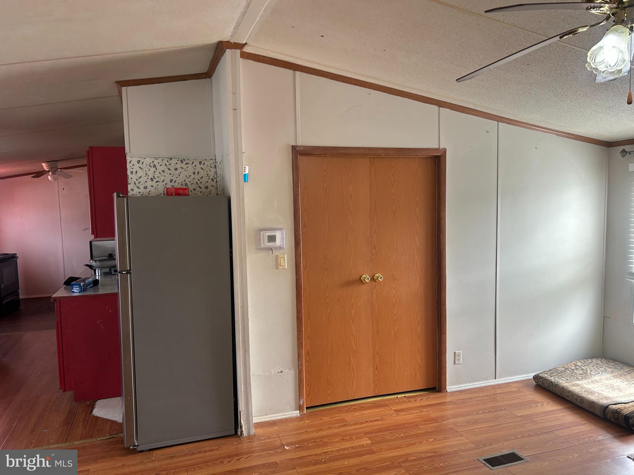 47 Evidence Road, Unit 231 Magnolia, DE 19962 - Photo 5 of 19 a view of a bedroom with wooden floor