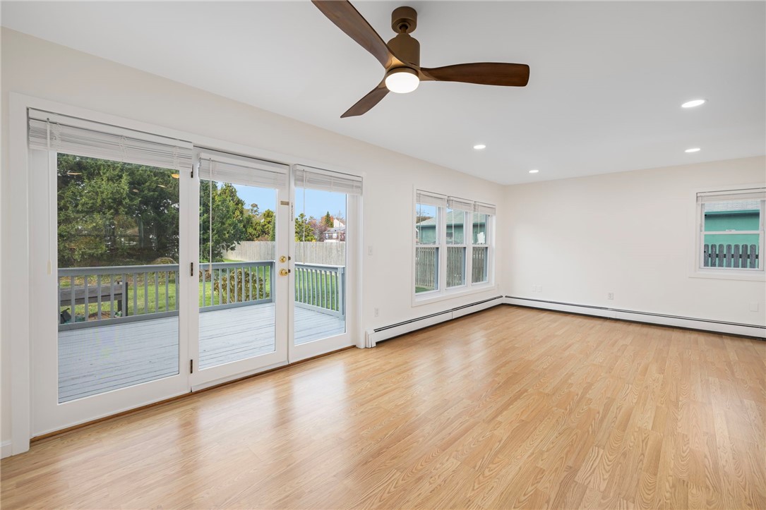 57 Clinton Street, Unit 57C Newport, RI 02840 - Photo 9 of 40 Living & Dining Area_Door to Deck