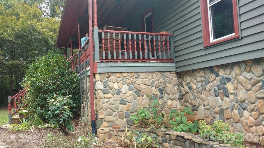 1188 Airport Road Rutherfordton, NC 28139 - Photo 1 of 1 a view of wooden house with a small yard