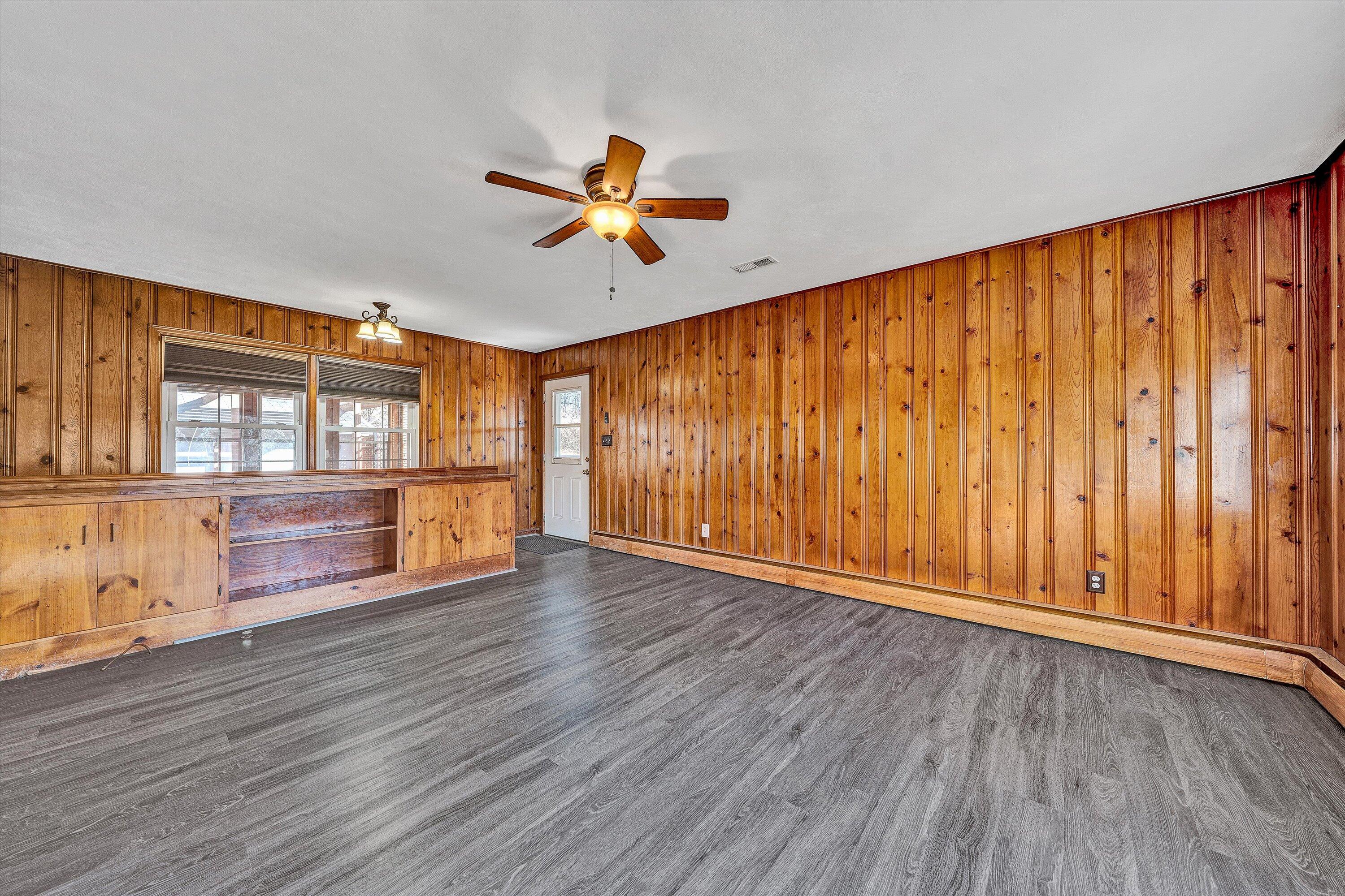 1944 Blue Ridge Springs Road Blue Ridge, VA 24064 - Photo 11 of 60 a view of room with wooden floor and fan