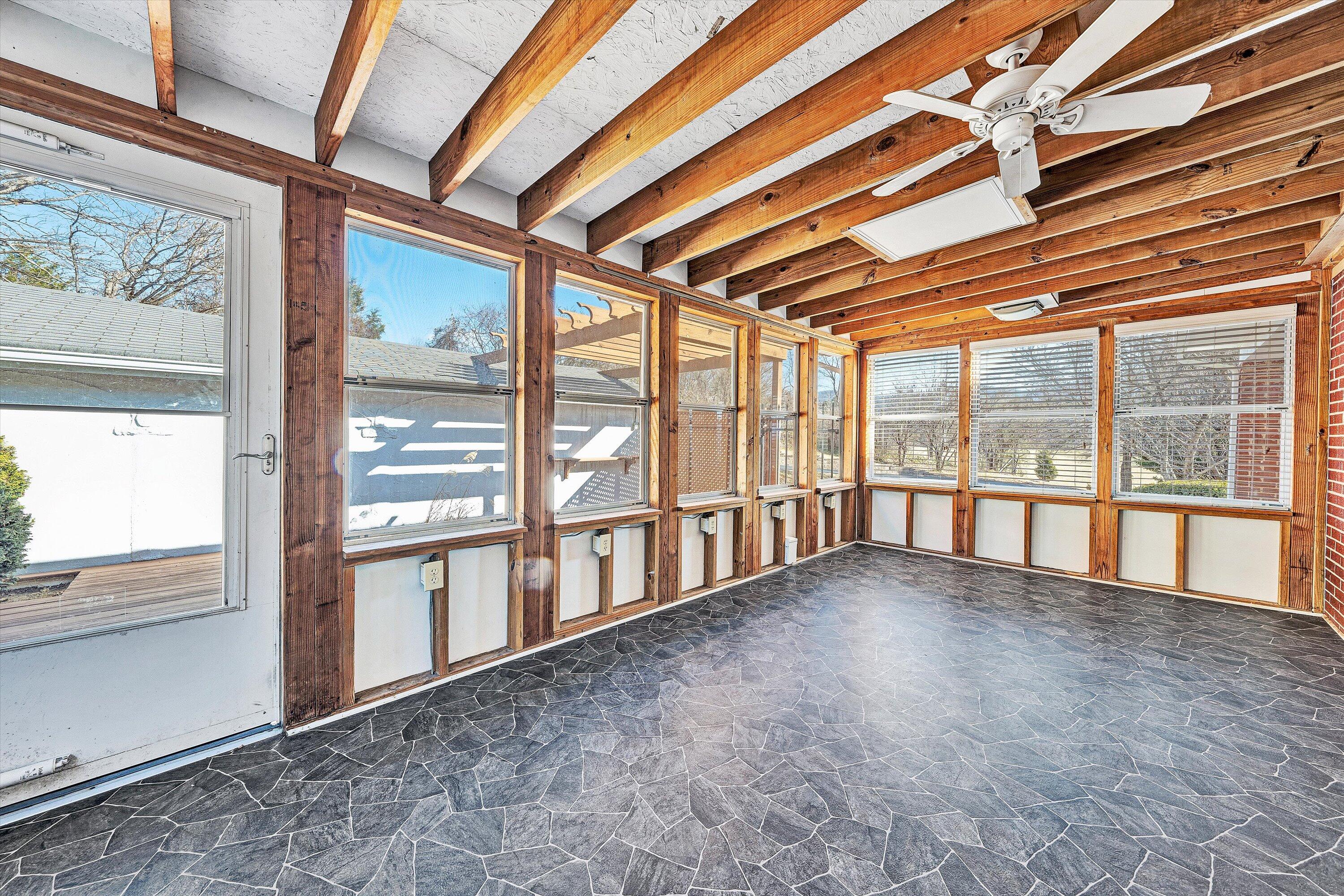 1944 Blue Ridge Springs Road Blue Ridge, VA 24064 - Photo 32 of 60 a view of an empty room with windows