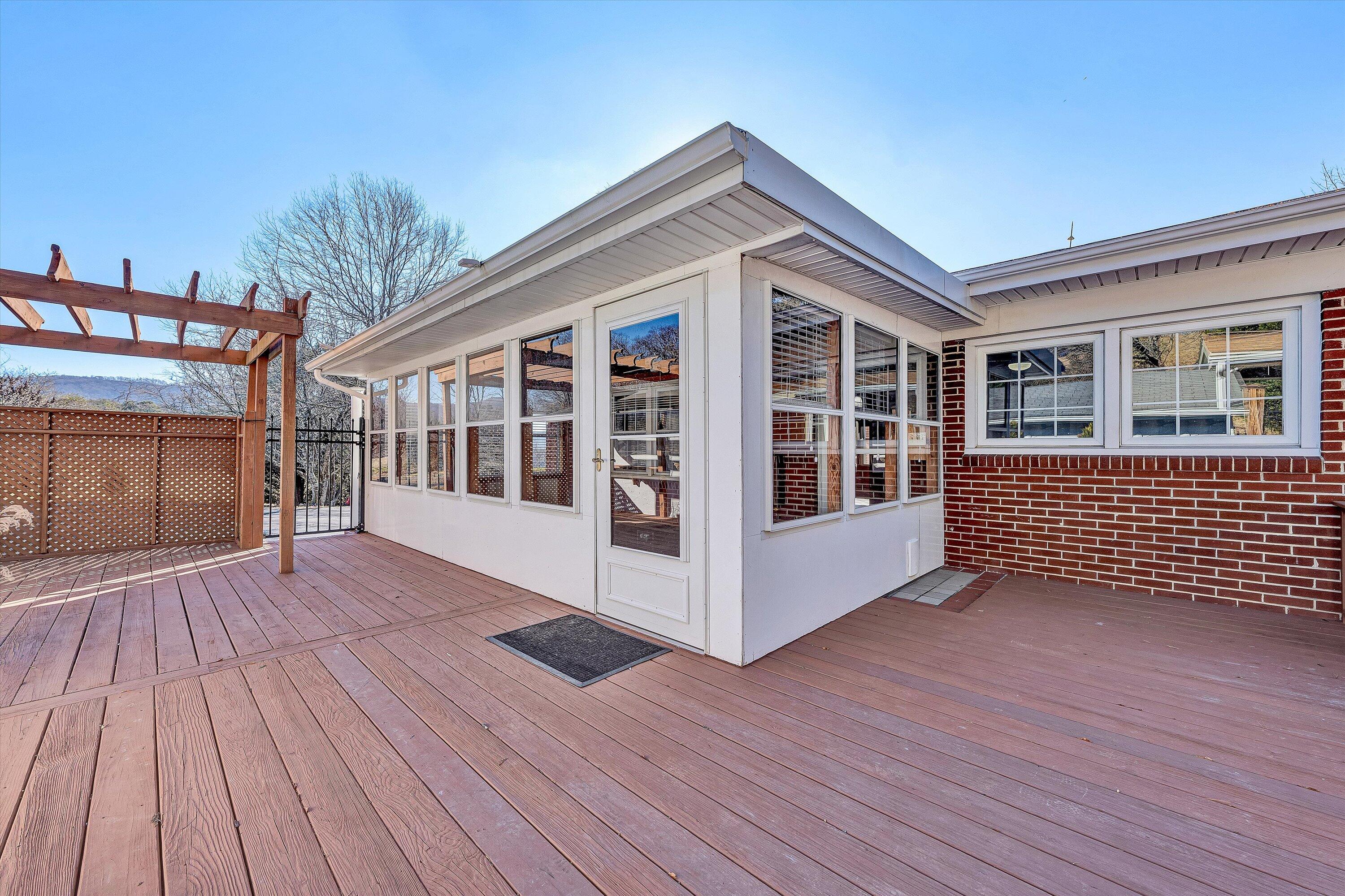 1944 Blue Ridge Springs Road Blue Ridge, VA 24064 - Photo 36 of 60 a view of a house with a balcony