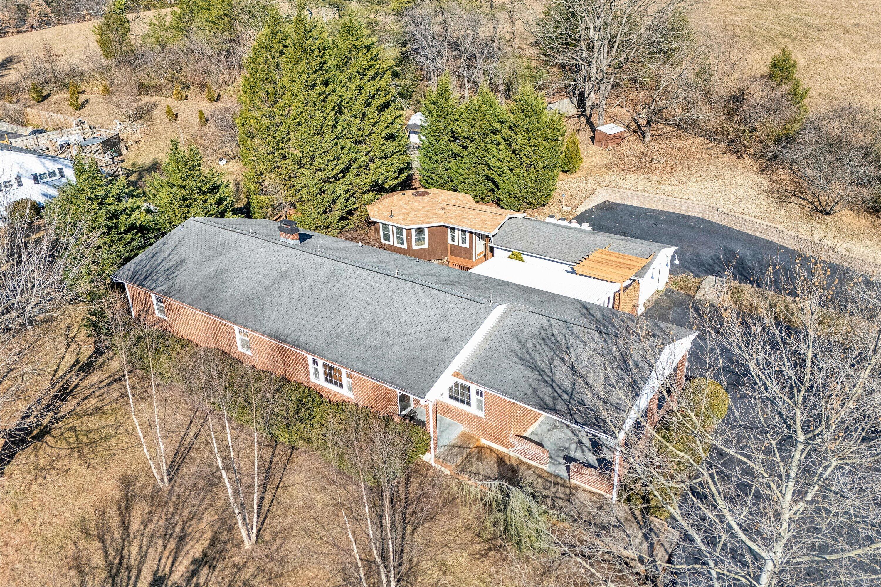 1944 Blue Ridge Springs Road Blue Ridge, VA 24064 - Photo 4 of 60 a view of a backyard