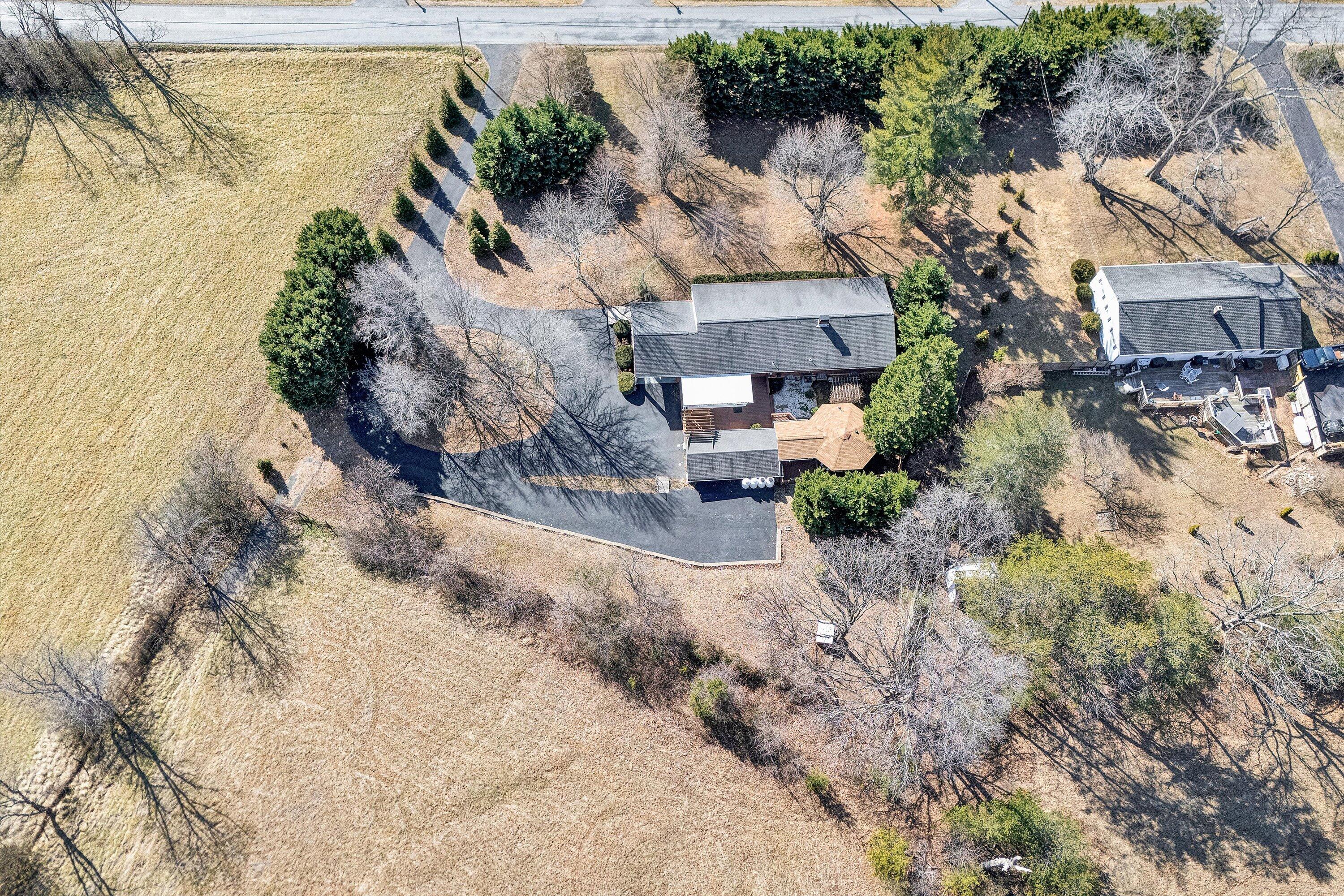1944 Blue Ridge Springs Road Blue Ridge, VA 24064 - Photo 59 of 60 a view of house with a yard