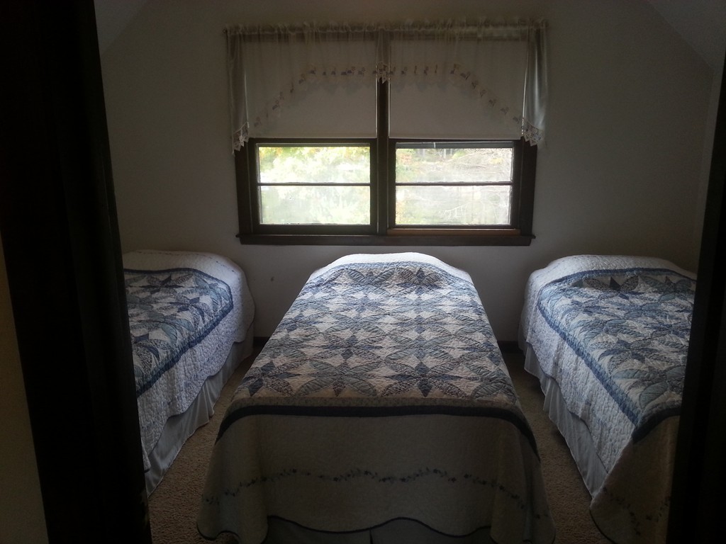 19 Pointview Road Ware, MA 01082 - Photo 19 of 19 a bedroom with two beds and a window