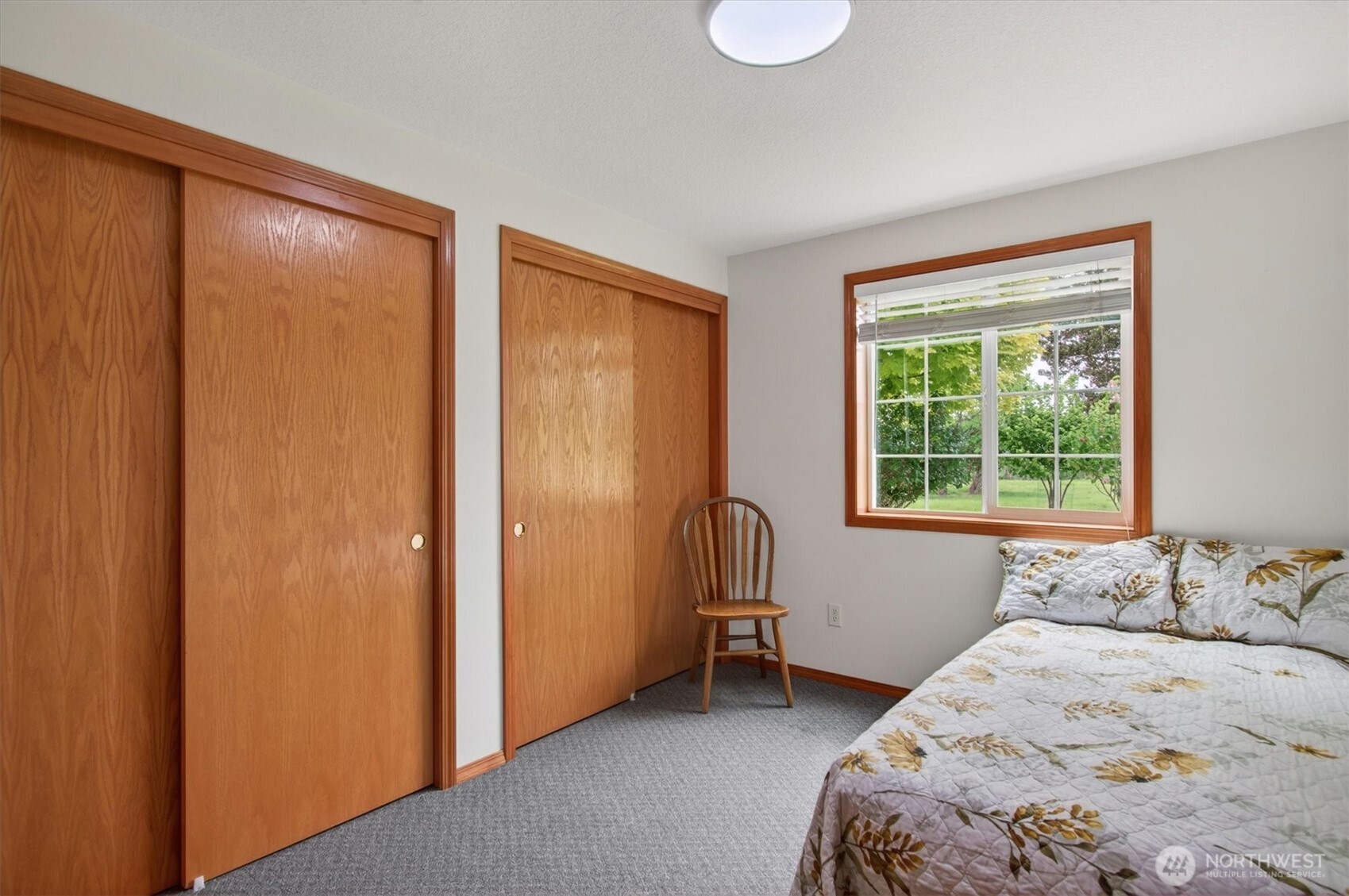218 West Sunny Sands Road Cathlamet, WA 98612 - Photo 21 of 40 a bedroom with a bed and a window