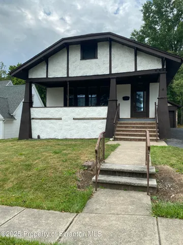 a view of house with front door