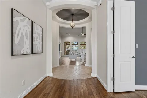a kitchen with stainless steel appliances a sink stove and cabinets