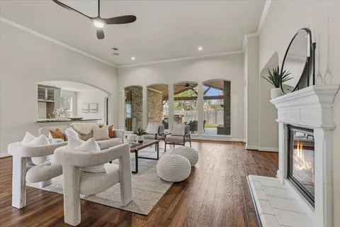 a view of a dining room with furniture and wooden floor