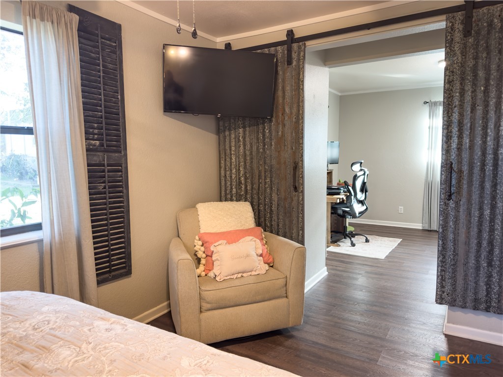 1374 Bego Road Goliad, TX 77963 - Photo 27 of 44 Barn-doors leading into additional space off primary room.