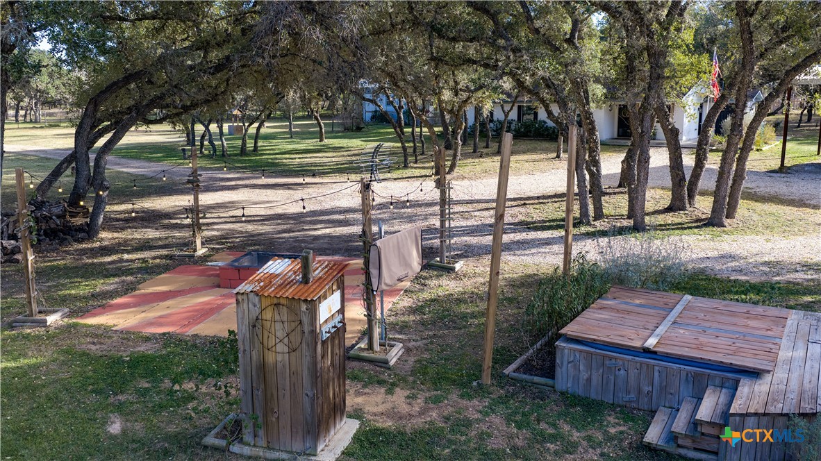 1374 Bego Road Goliad, TX 77963 - Photo 34 of 44 Come sit next to the fire this winter or enjoy the stock tank pool (pump and supplies included) this summer!