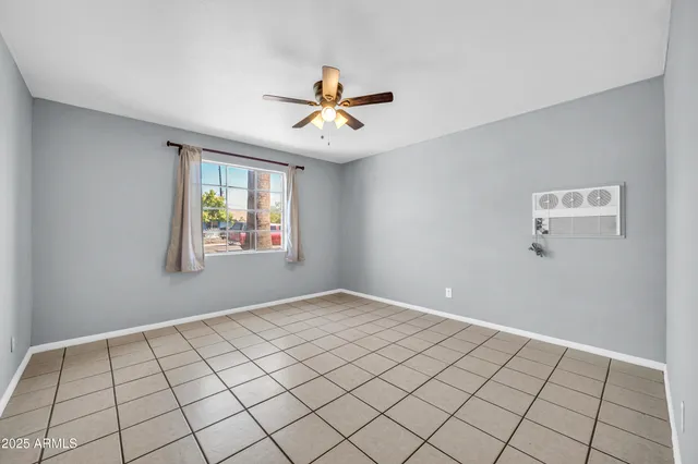 a view of an empty room and window