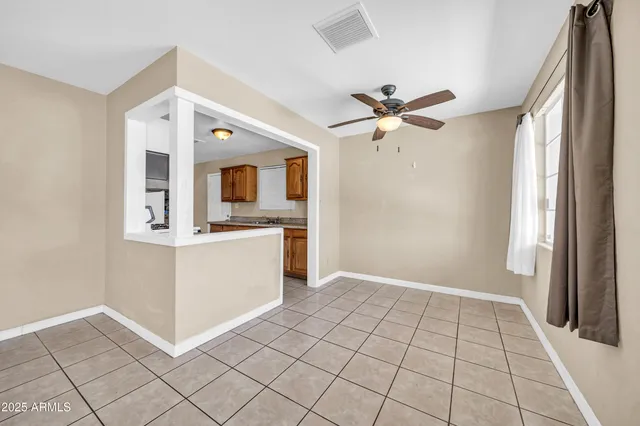 a view of an empty room and window