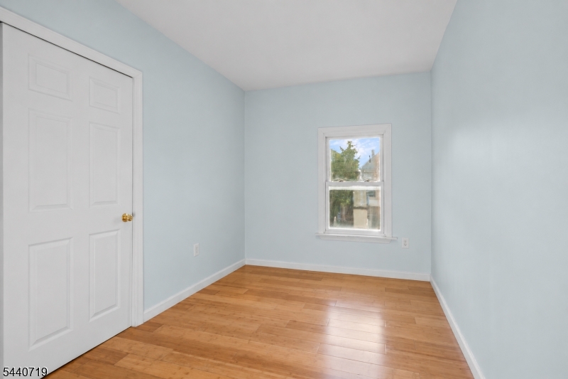 136 Smith Street Elizabeth, NJ 07201 - Photo 27 of 38 an empty room with window