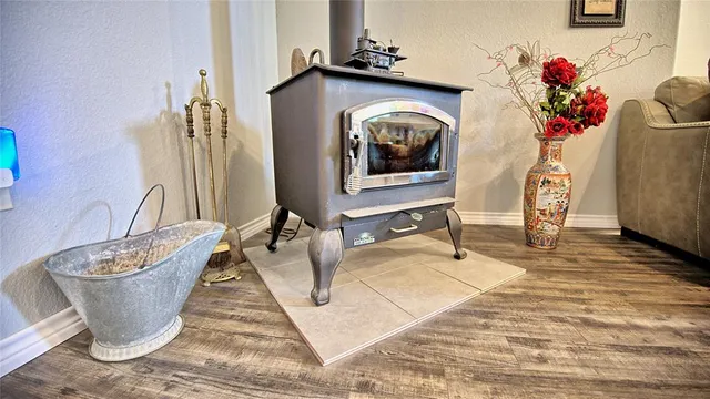 a living room with furniture and flowers