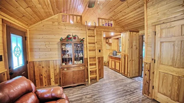 a view of livingroom with furniture and wooden floor