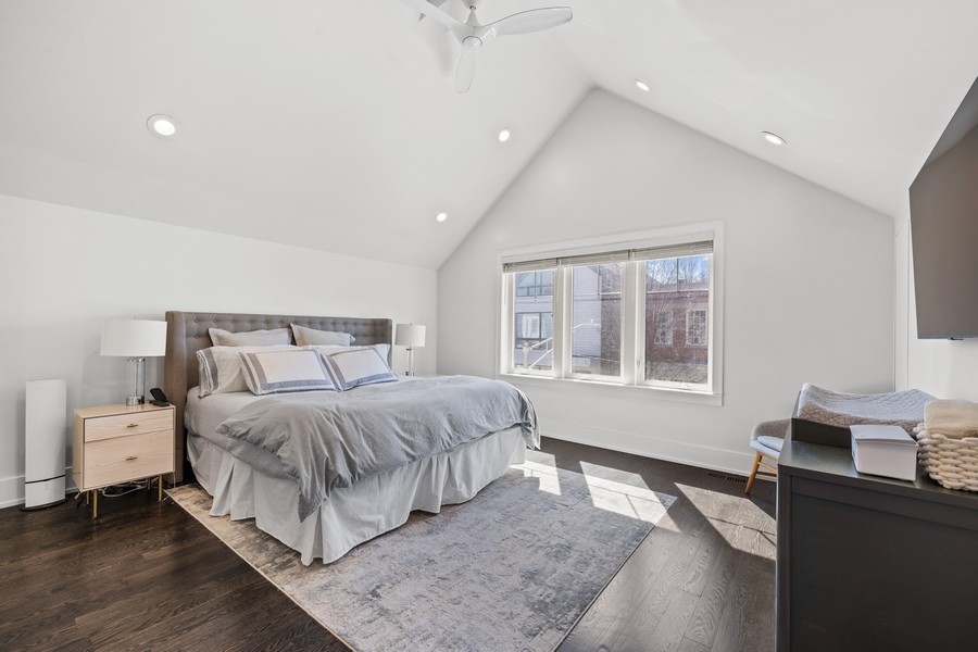 1226 West Draper Street Chicago, IL 60614 - Photo 11 of 28 a spacious bedroom with a bed and window
