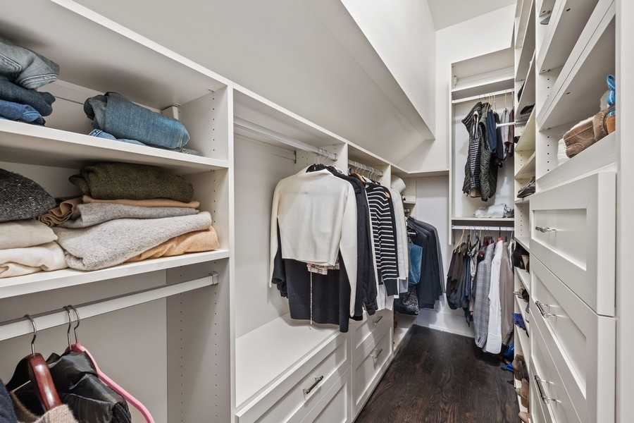 1226 West Draper Street Chicago, IL 60614 - Photo 13 of 28 a view of walk in closet with clothes and shoes