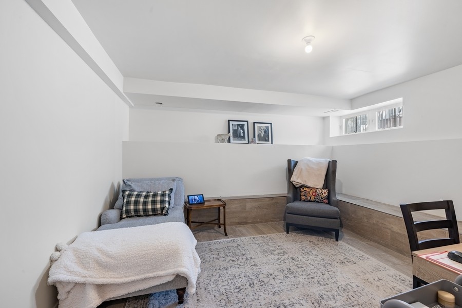 1226 West Draper Street Chicago, IL 60614 - Photo 20 of 28 a bedroom with furniture and a rug