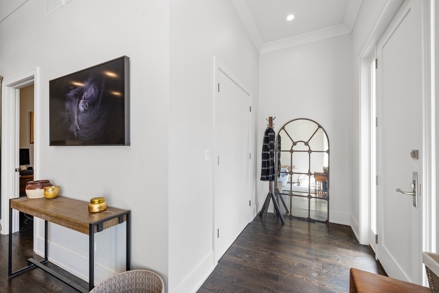 1226 West Draper Street Chicago, IL 60614 - Photo 2 of 28 a view of a livingroom with wooden floor and entryway