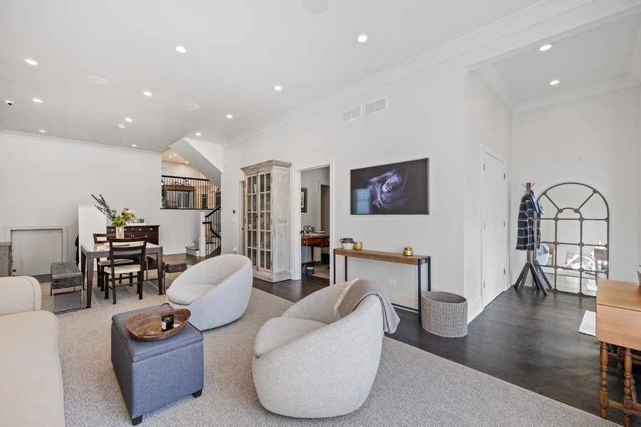 1226 West Draper Street Chicago, IL 60614 - Photo 3 of 28 a living room with furniture and a wooden floor
