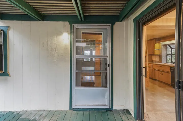 a view of a hardwood & kitchen