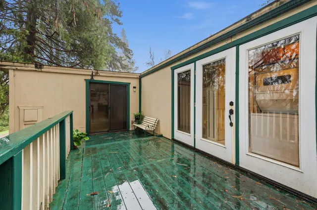 a view of a porch with a yard