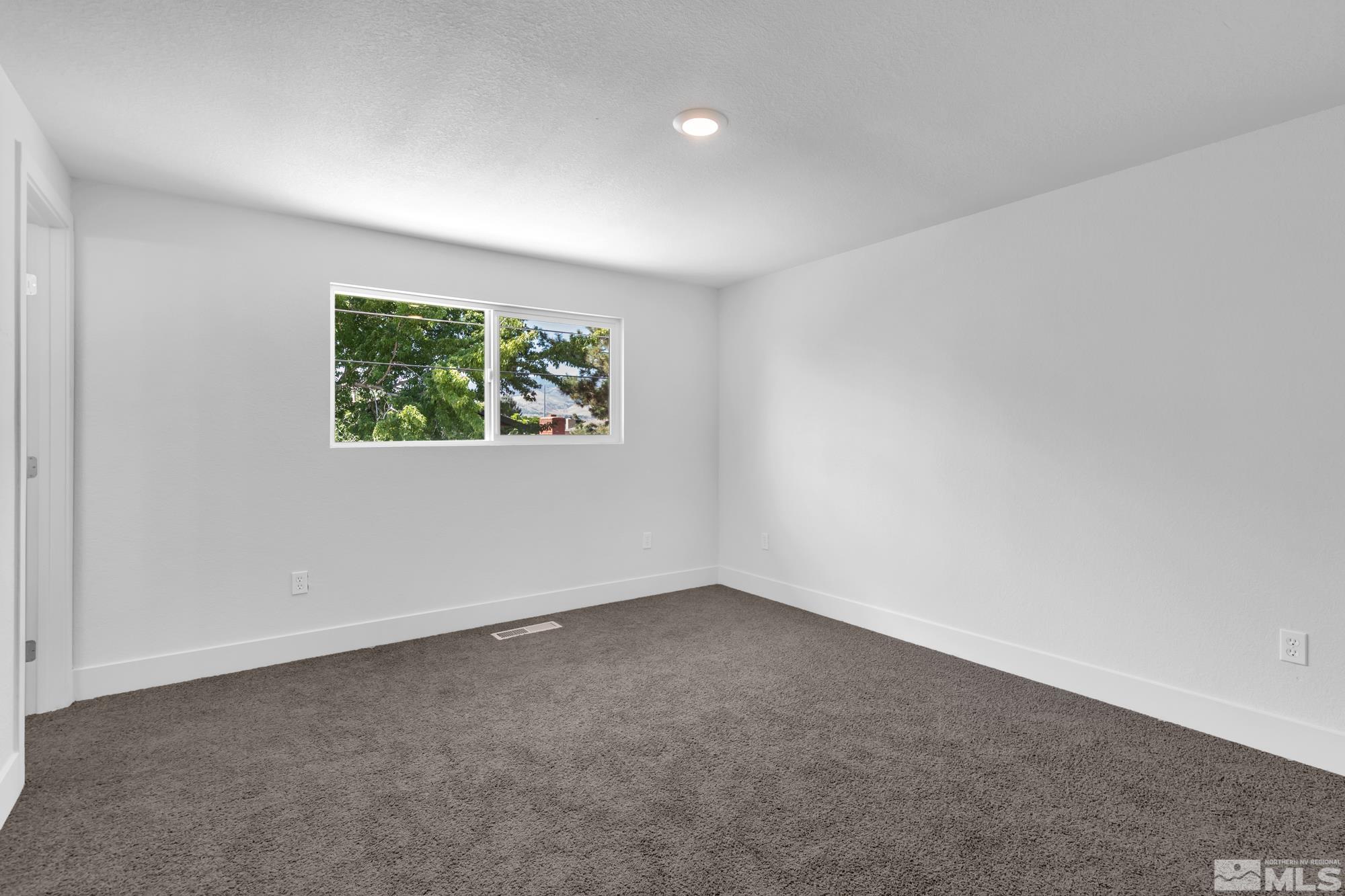 1750 Carlin Street Reno, NV 89503 - Photo 12 of 38 an empty room with windows