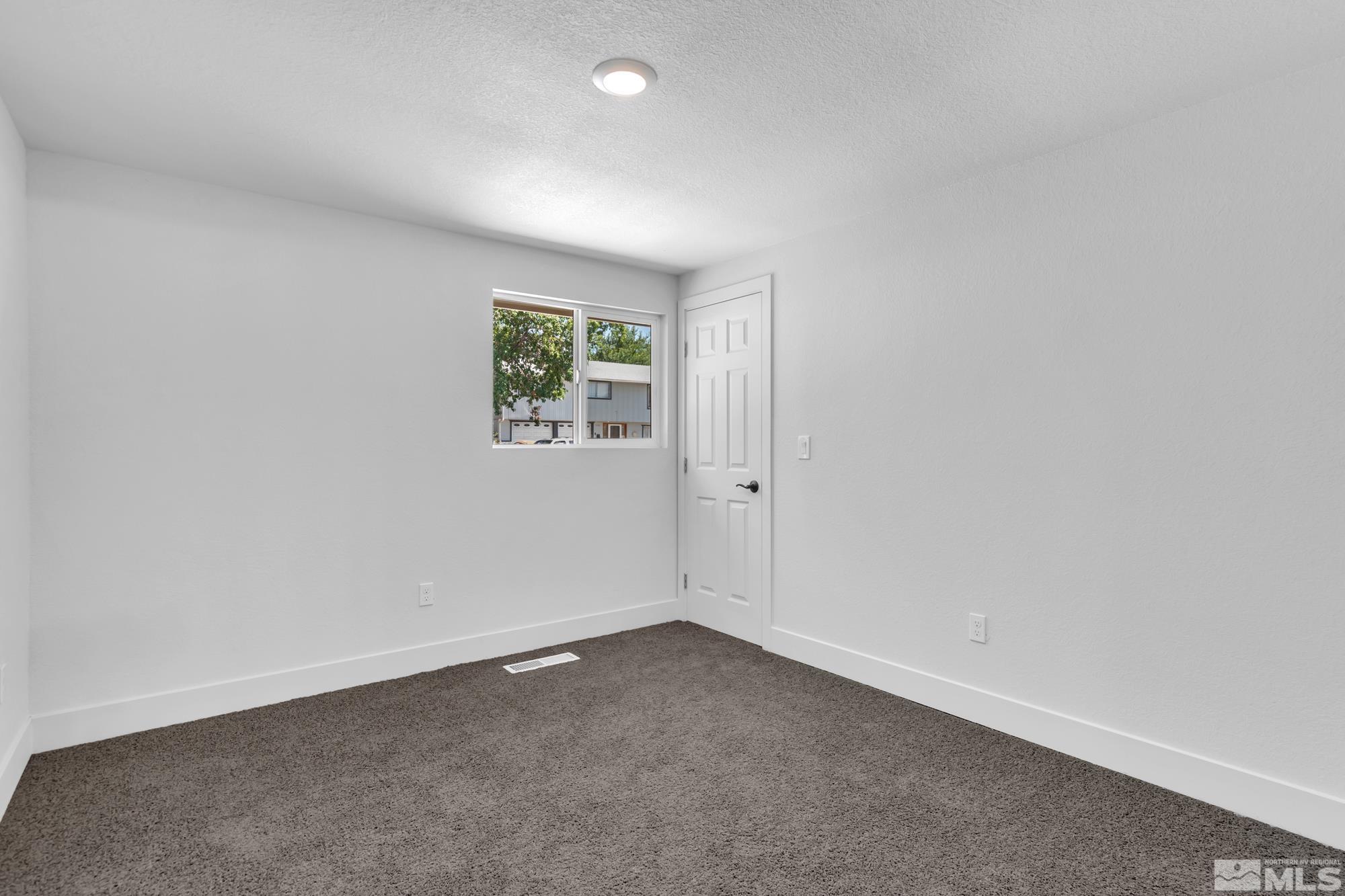 1750 Carlin Street Reno, NV 89503 - Photo 14 of 38 an empty room with windows