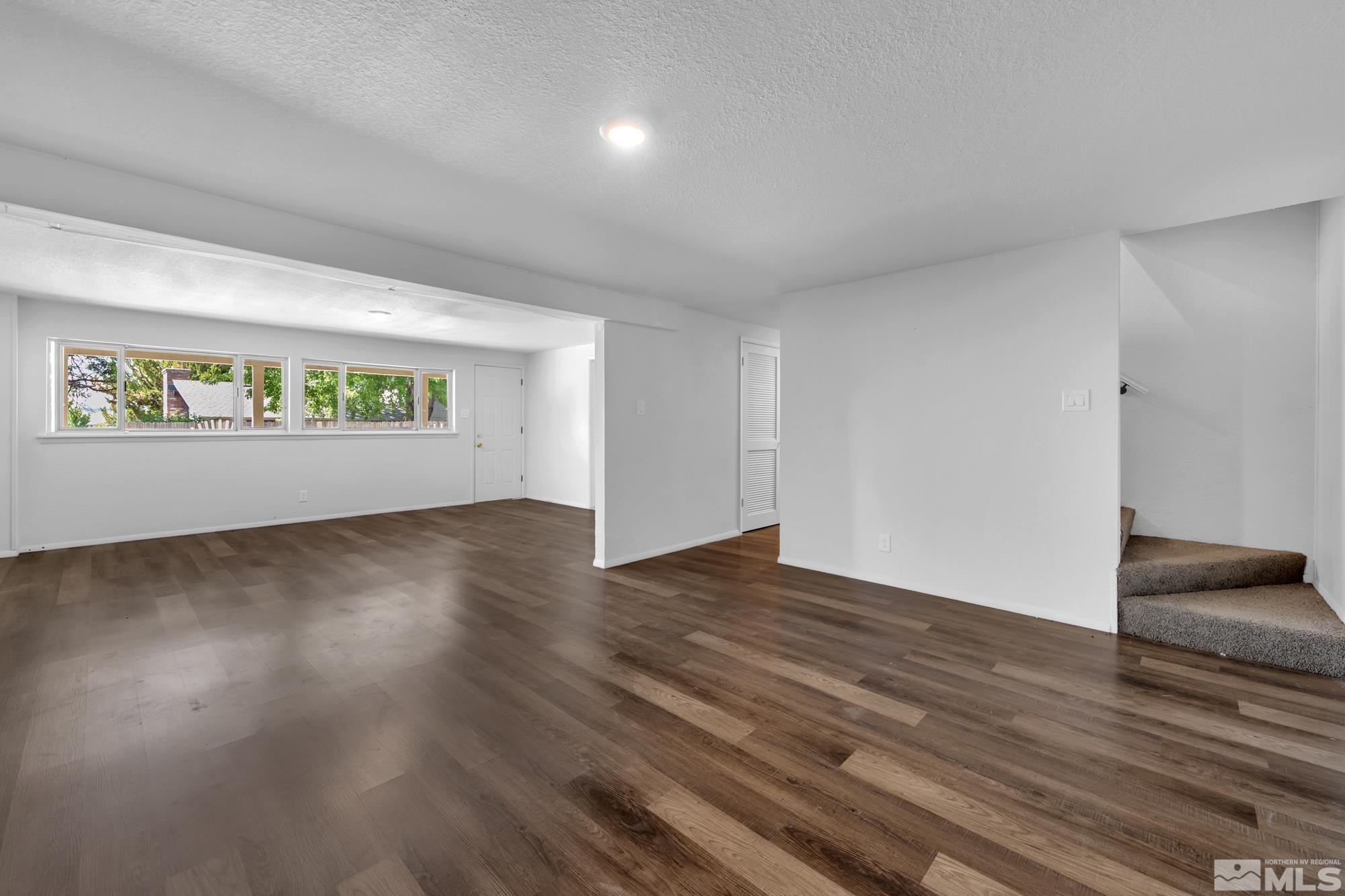 1750 Carlin Street Reno, NV 89503 - Photo 18 of 38 a view of an empty room and wooden floor