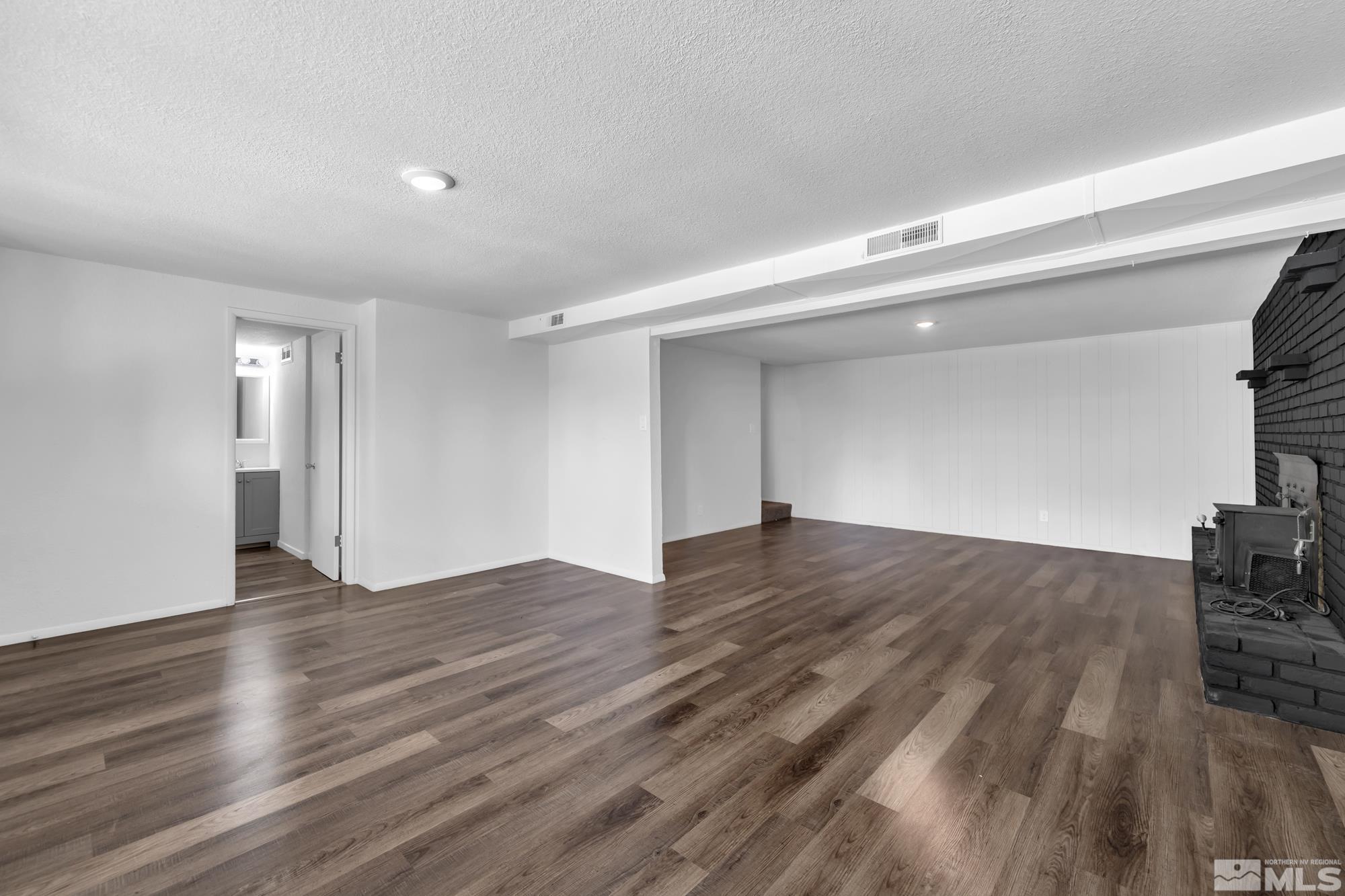 1750 Carlin Street Reno, NV 89503 - Photo 20 of 38 a view of empty room with wooden floor